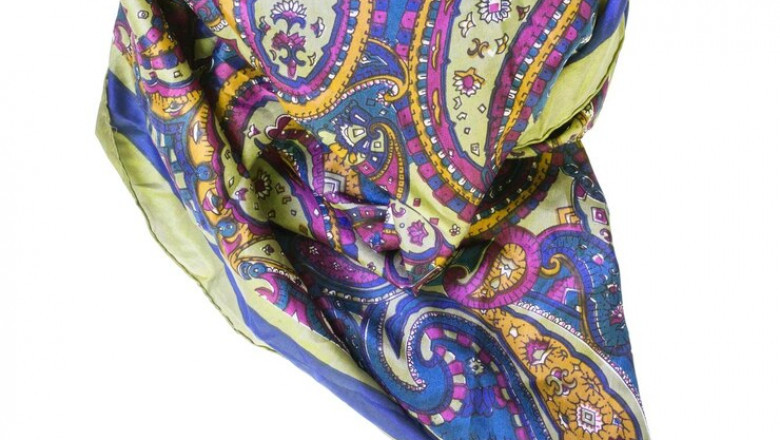 How does a double-sided silk scarf provide a versatile and stylish option for layering